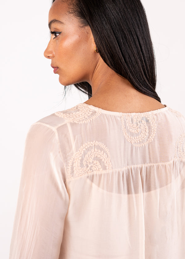 Embroidered blush pink shirt