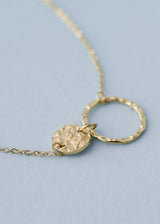 Gold connected circle pendant necklace