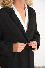 Black textured cocoon coat