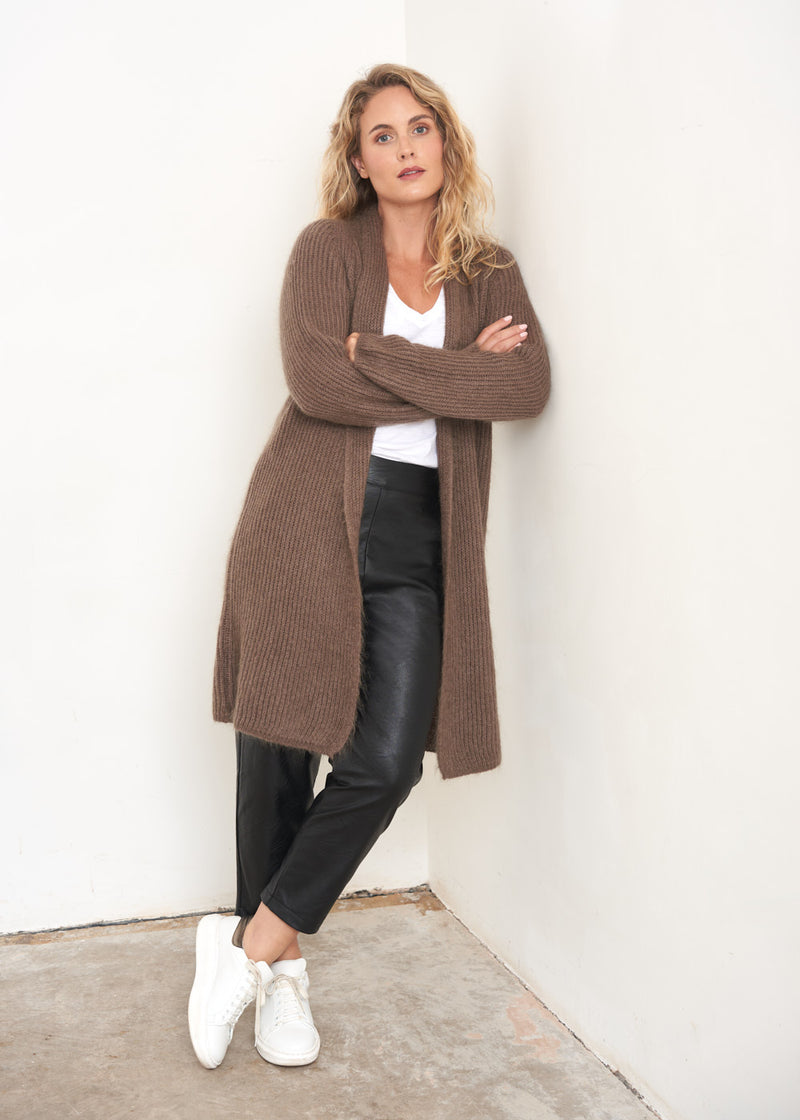 Black cropped faux leather trousers