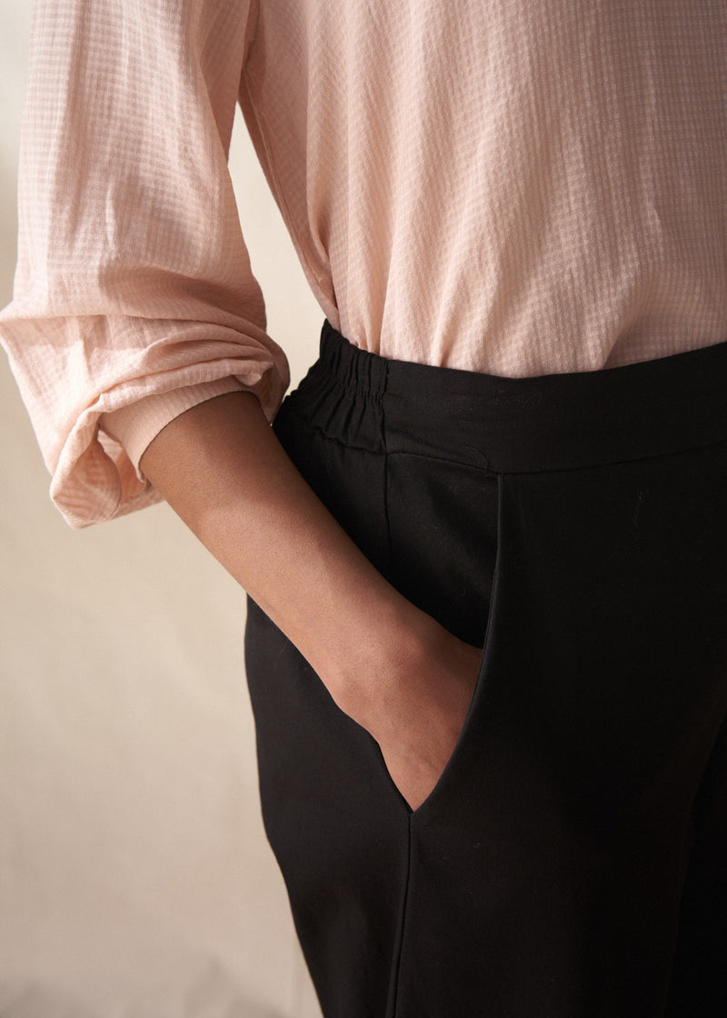 Black cotton tapered trousers