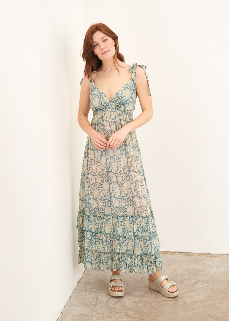A model wearing a Pale blue ditsy floral strappy sundress
