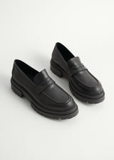 Black leather loafer