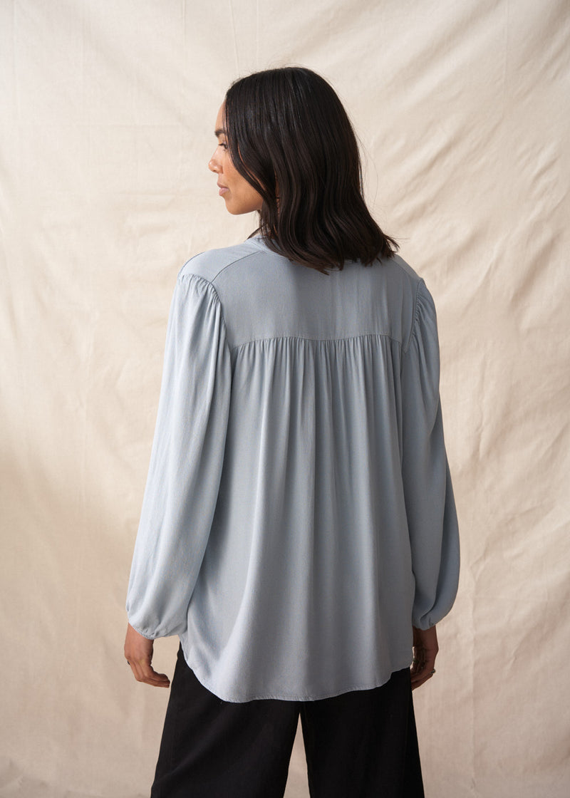 Pale blue long sleeve shirt