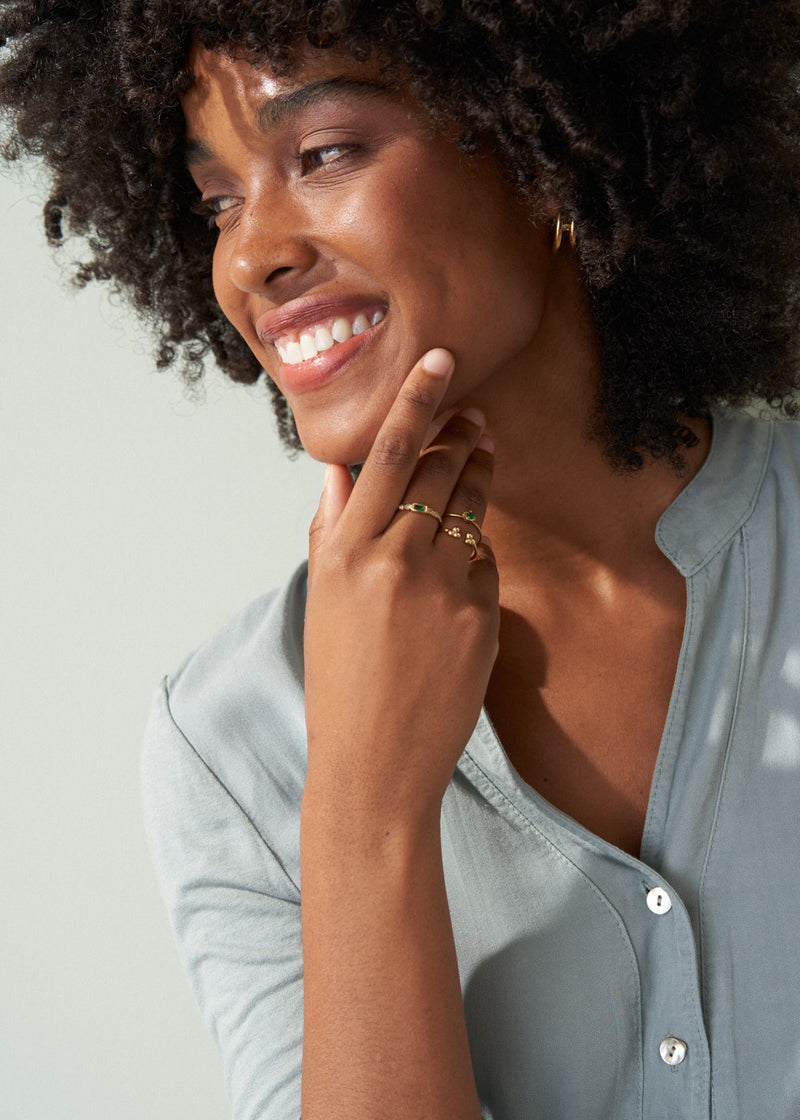 Minimal gold ring with green crystal stone