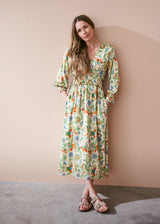 Pale yellow midi dress with floral print