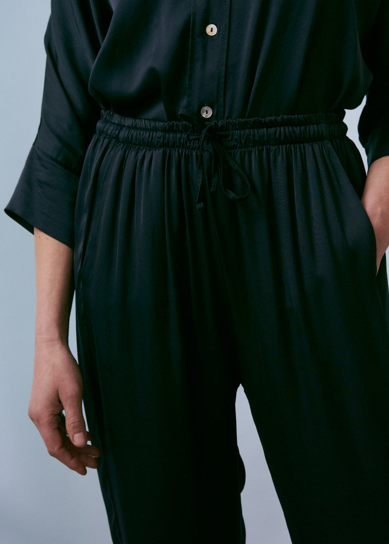 Navy satin tapered trousers