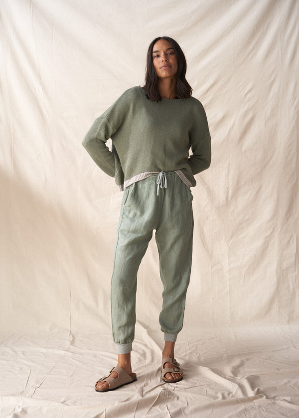 Light khaki sweater with silver trim detail