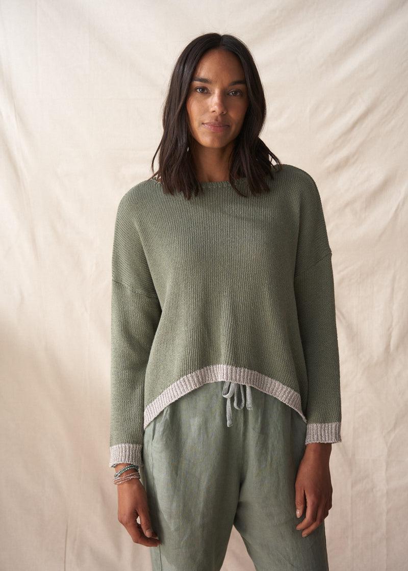 Light khaki sweater with silver trim detail