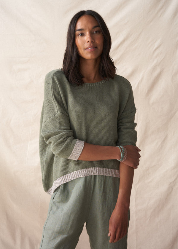 Light khaki sweater with silver trim detail