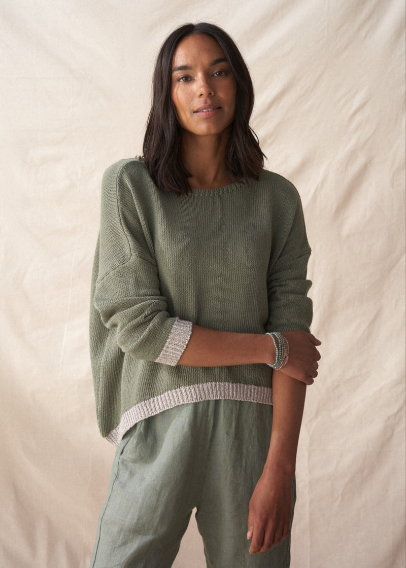 Light khaki sweater with silver trim detail