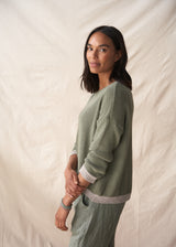 Light khaki sweater with silver trim detail