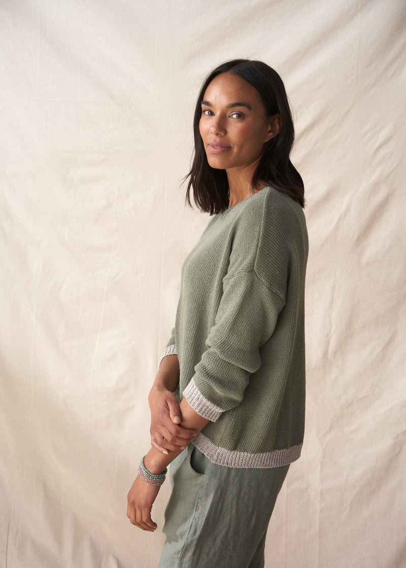 Light khaki sweater with silver trim detail