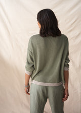 Light khaki sweater with silver trim detail