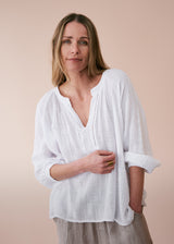 White cotton top with embroidered detail