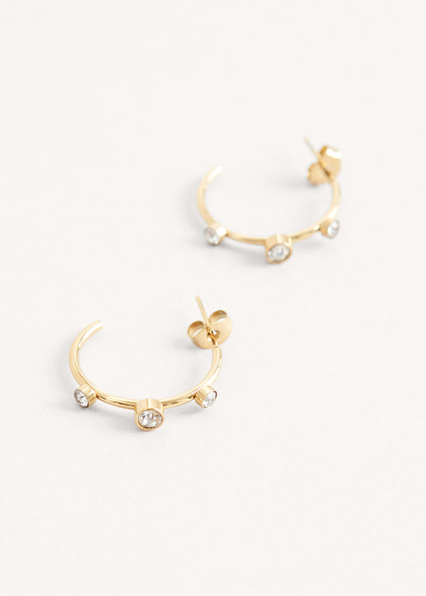Gold hoop earrings with crystals