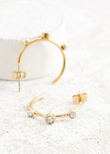 Gold hoop earrings with crystals