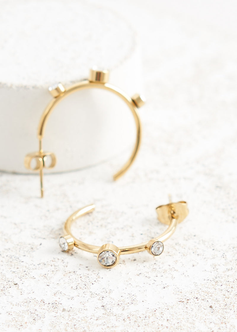 Gold hoop earrings with crystals