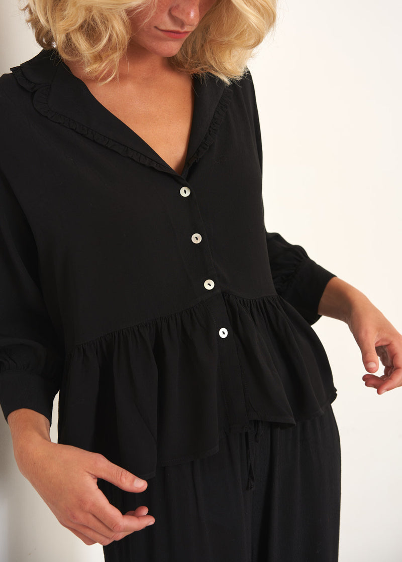 Black peplum top with buttons