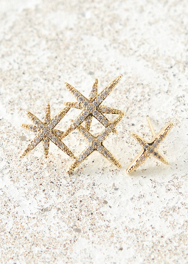 Mismatched star stud earrings