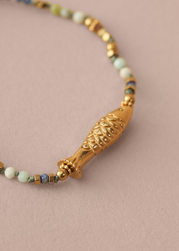 Colourful bead bracelet with fish pendant