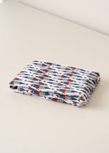 Waffle beach towel with blue and red fish pattern