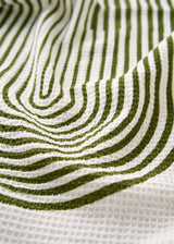 Waffle beach towel with white and green pattern