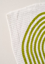 Waffle beach towel with white and green pattern