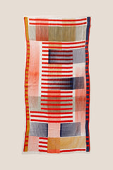 White waffle beach towel with red stripe pattern