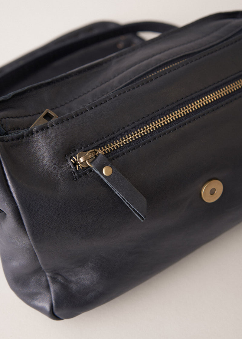 Black leather bag with gold stud detail