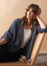 Women wearing a Dina Chunky Knit Cardigan in Slate Grey
