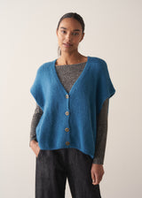 Bright blue knitted sleevless waistcoat