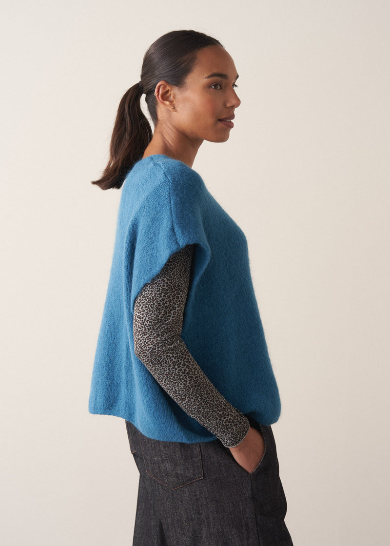 Bright blue knitted sleevless waistcoat