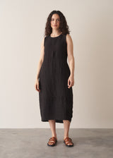 Woman wearing black linen cocoon dress