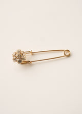 Gold pin brooch with crystal flower