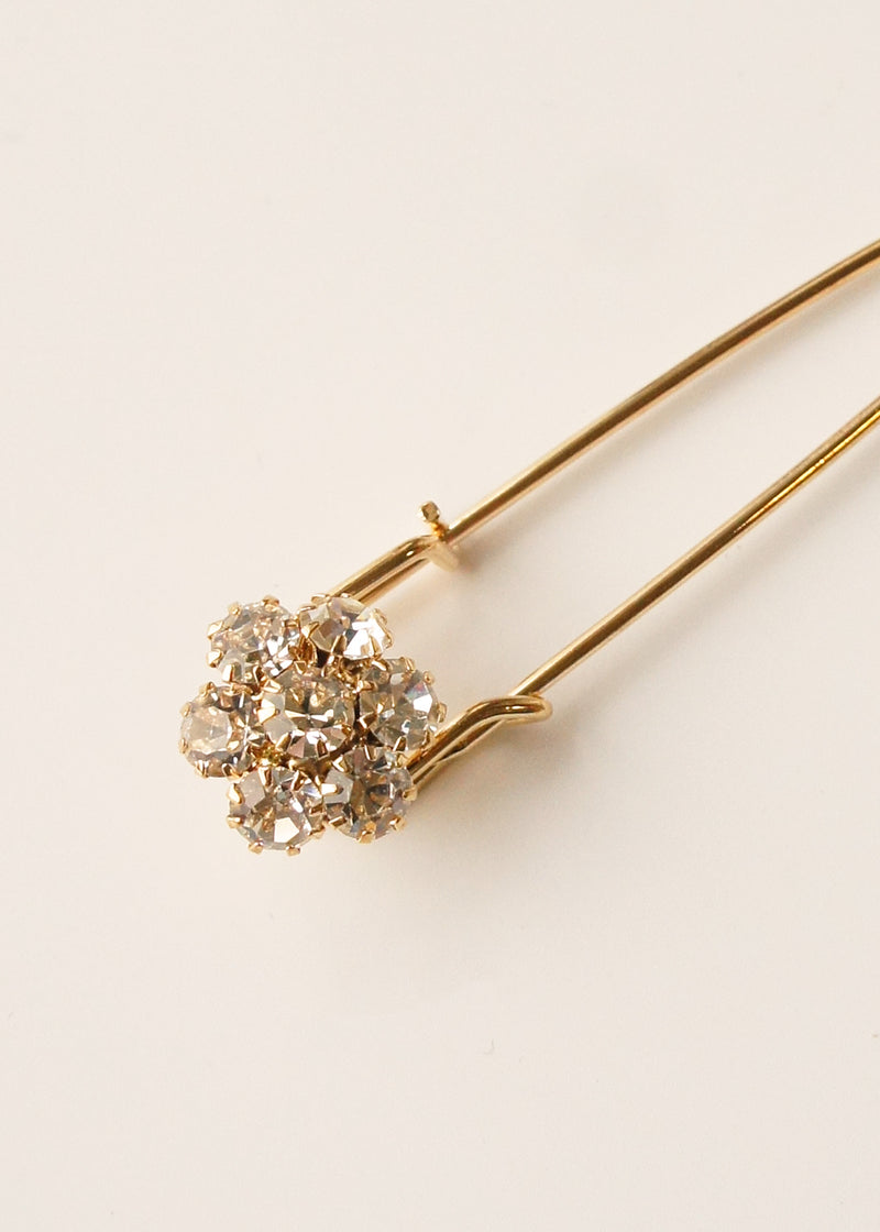 Gold pin brooch with crystal flower